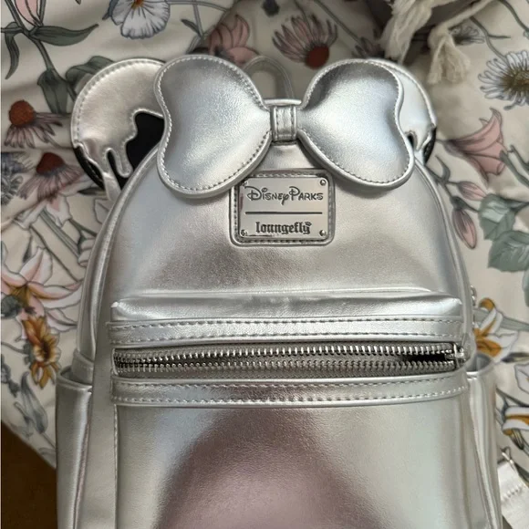 Disney | Bags | Disney Metallic Silver Backpack | Poshmark display picture 1
